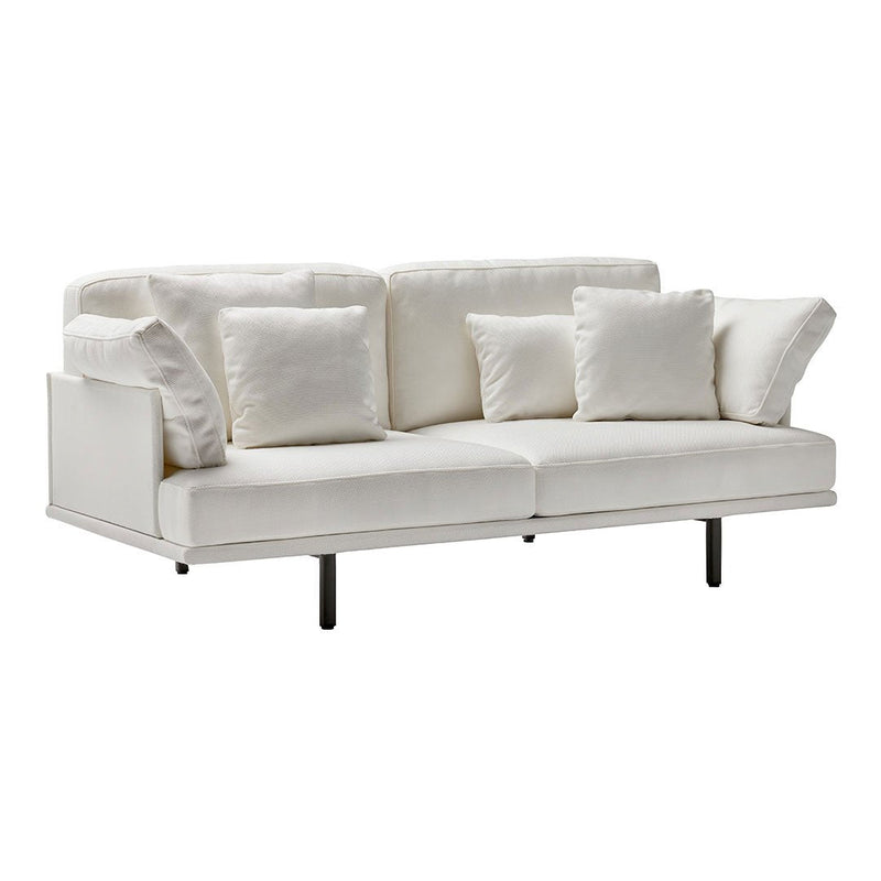 White modern sofa with plush white cushions, sleek lines, and minimalist design. Perfect for contemporary interiors.