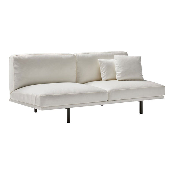 White fabric sofa with clean lines, featuring a minimalist design and plush cushions for a modern look.