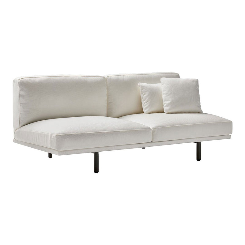 White fabric sofa with clean lines, featuring a minimalist design and plush cushions for a modern look.
