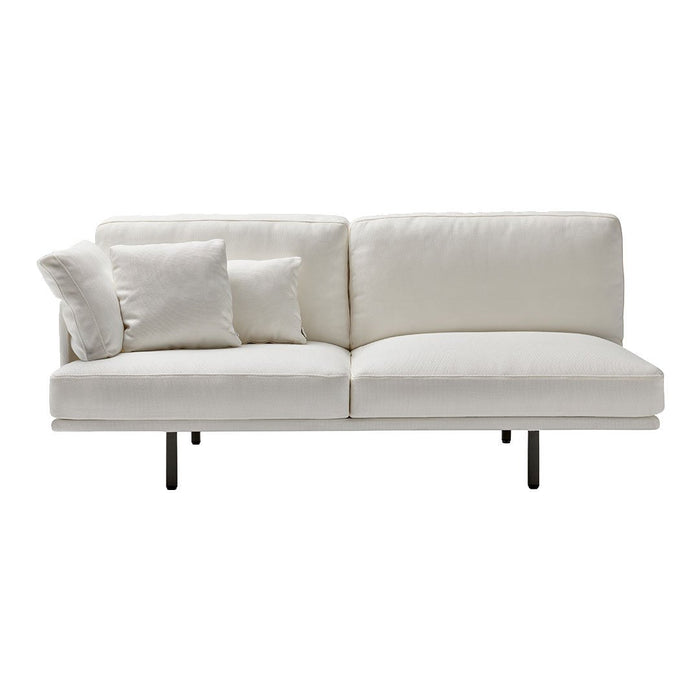 Modern white sofa with two plush pillows, featuring a clean, minimalist design and soft fabric upholstery.