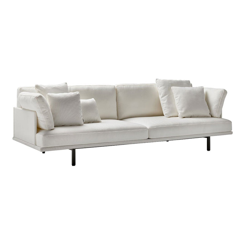 White modern sofa with plush cushions on a sleek black leg base, featuring a minimalist, contemporary design.