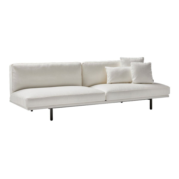 Modern white sectional sofa with clean lines and plush cushions. Minimalist design for contemporary interiors.