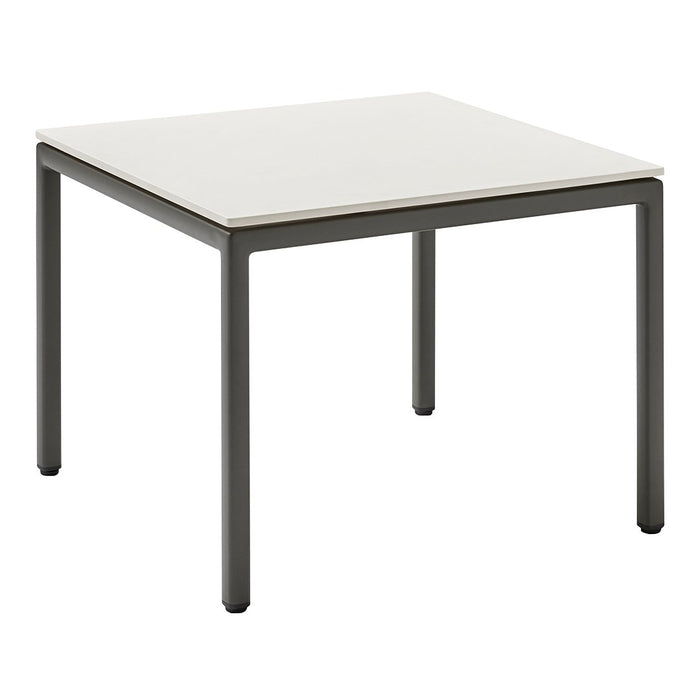Square table with a sleek white top and dark gray metal legs, featuring a minimalist design.