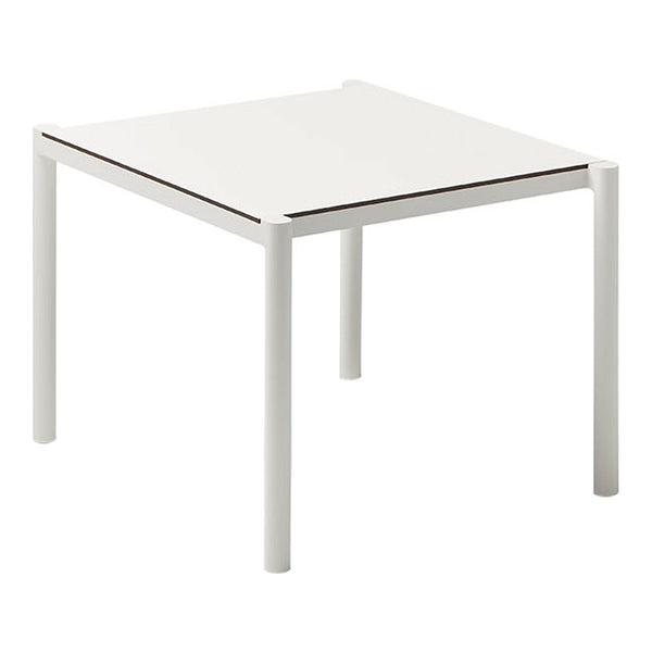 White square table with a sleek minimalist design and contrasting dark wood trim along the edges. Perfect for modern decor.
