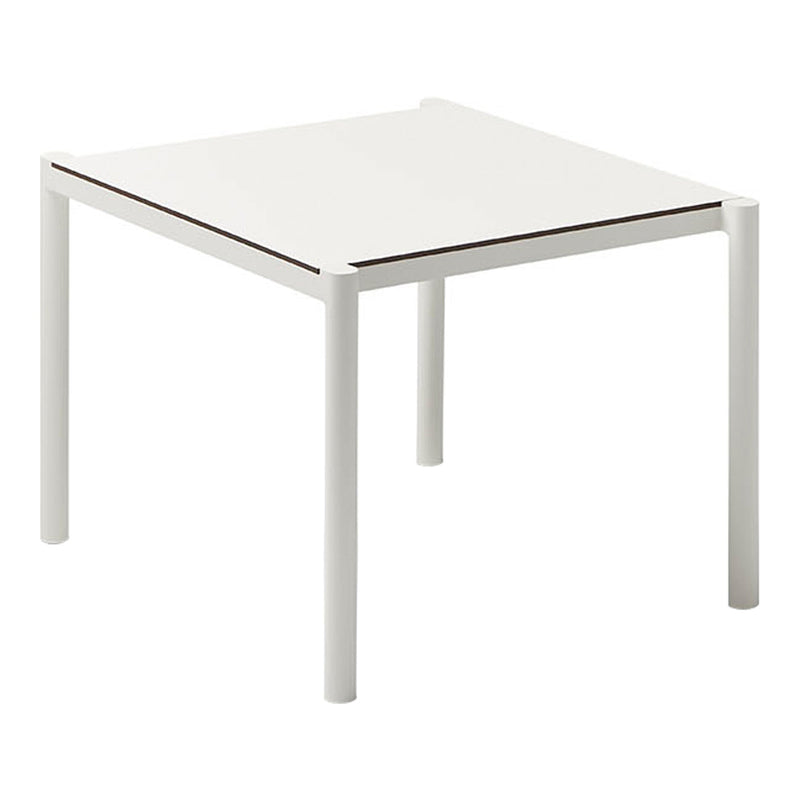 White square table with a sleek minimalist design and contrasting dark wood trim along the edges. Perfect for modern decor.