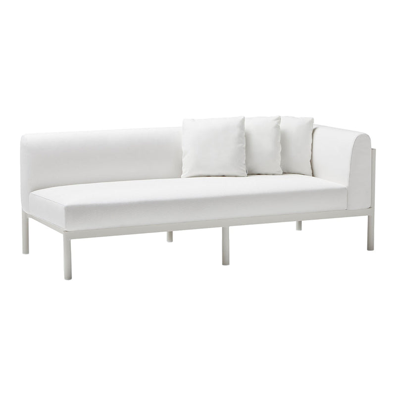Modern white sectional sofa with sleek lines and three plush pillows. Ideal for minimalist and contemporary decor.