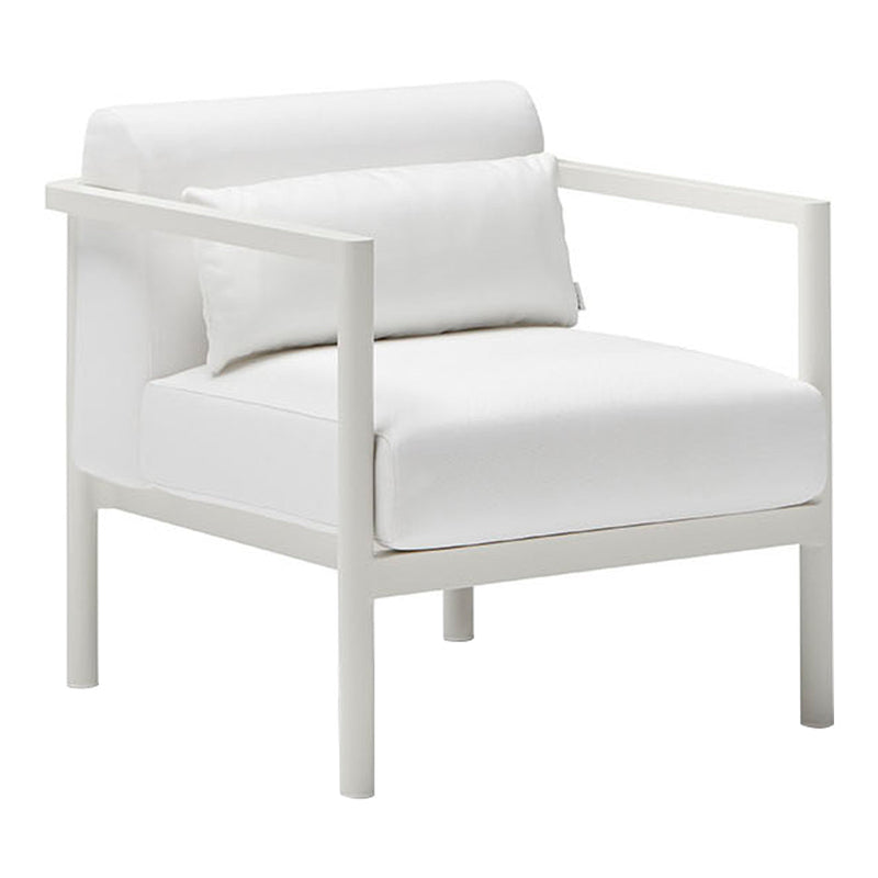 White armchair with a minimalist design featuring a smooth fabric and simple geometric lines.