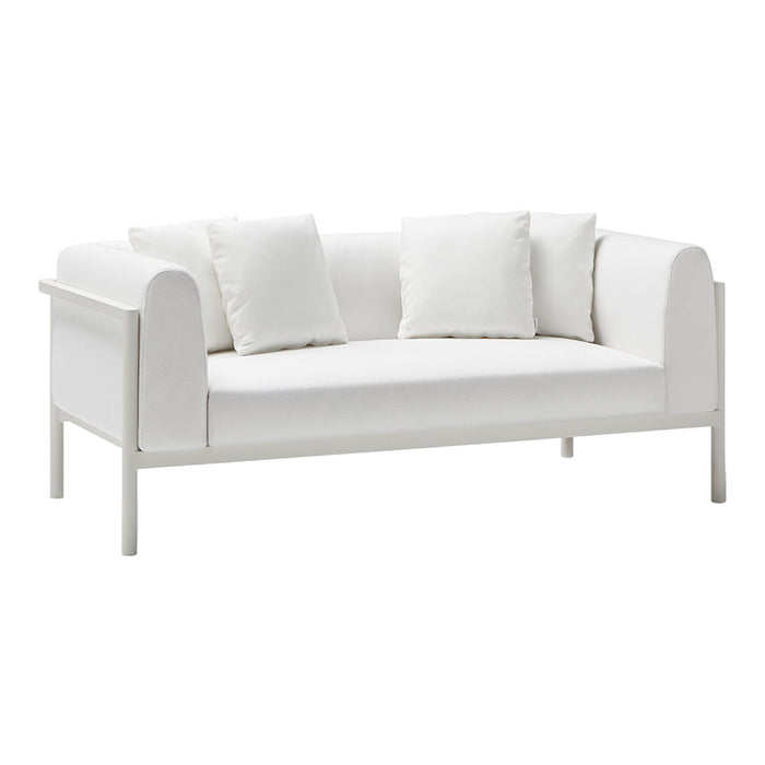 White minimalist sofa with soft, rounded edges and three matching cushions, creating a clean, modern look.