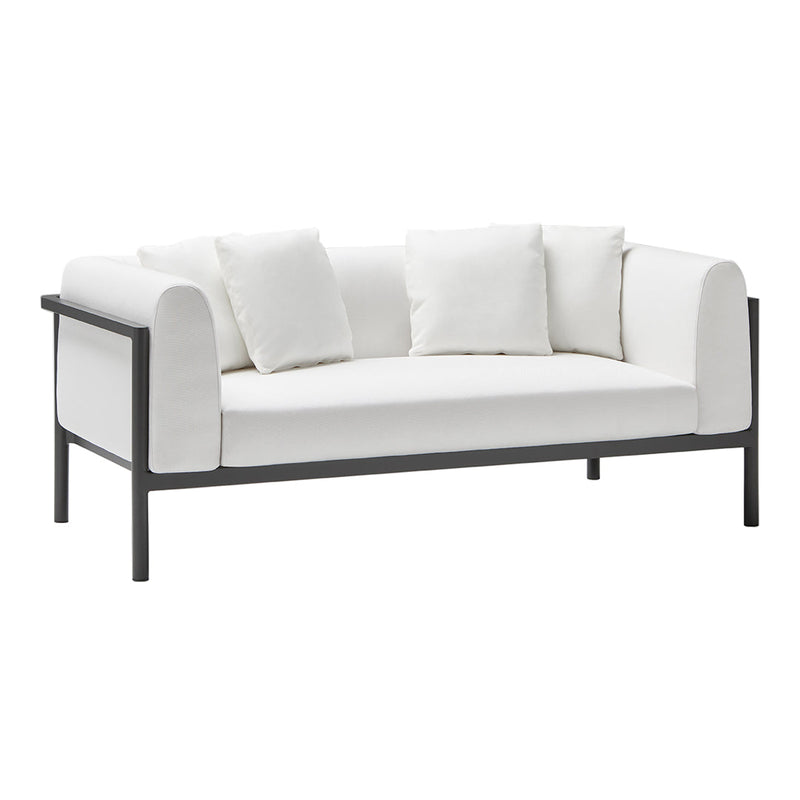 Modern white fabric sofa with plush cushions and sleek black metal frame, complementing minimalist decor.