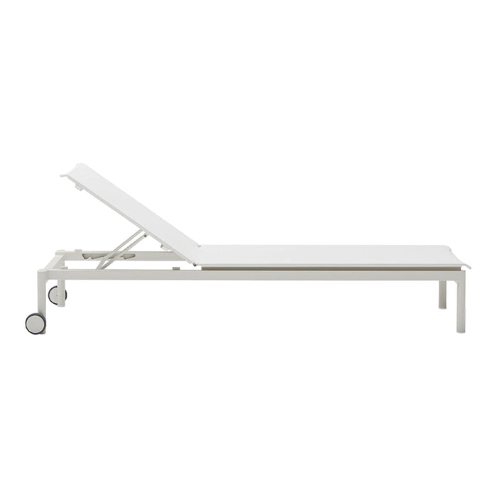 White adjustable lounge chair with a sleek, minimalist design and smooth surface, perfect for outdoor settings.