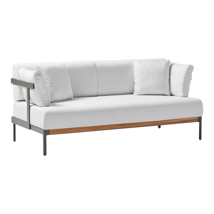 Modern white sofa with plush cushions and a sleek metal frame, featuring natural wood accents and minimalist design.