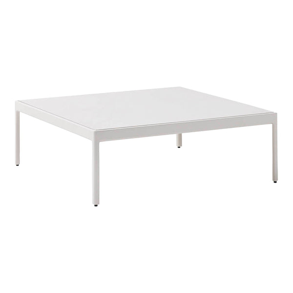 Minimalist white square coffee table with a sleek, smooth surface and clean lines, perfect for modern decor.