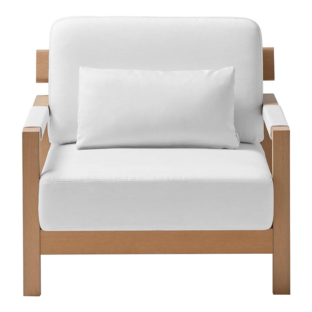 White upholstered armchair with a light wood frame and a matching lumbar pillow. Minimalist design, clean lines.