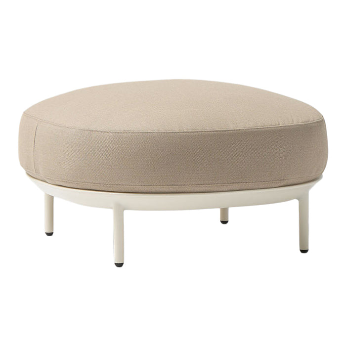 Round ottoman with a soft beige cushion and sleek white base, perfect for modern decor.