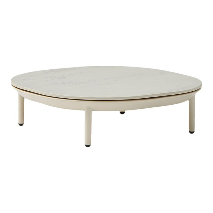 Round coffee table with a sleek white marble top and light beige legs, featuring a minimalist design.