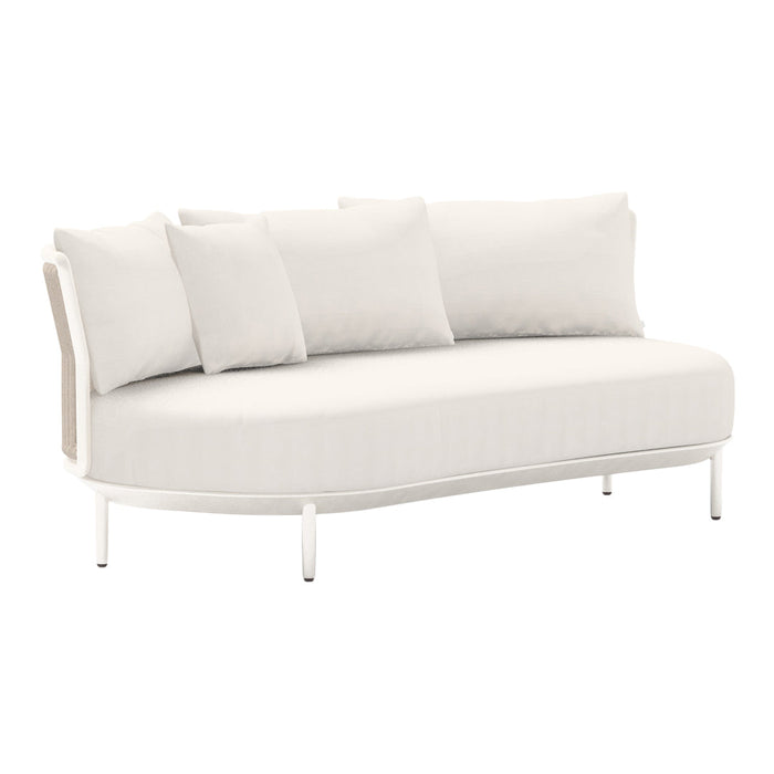 White curved sofa with textured fabric and plush cushions, featuring a minimalist design and sleek metal legs.