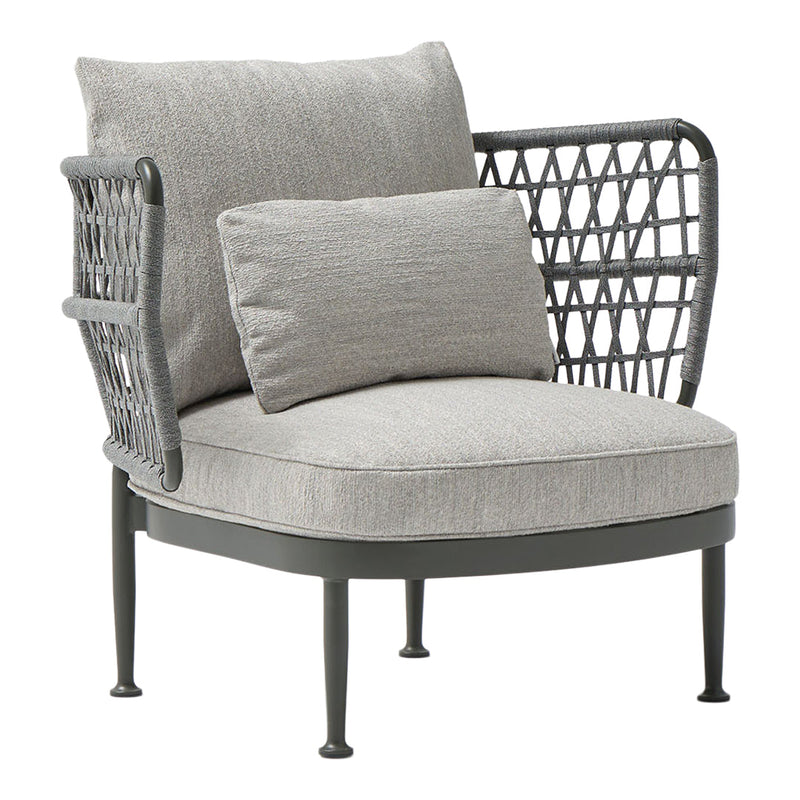 Modern grey armchair with a geometric woven pattern and plush cushions, featuring a sleek black frame.