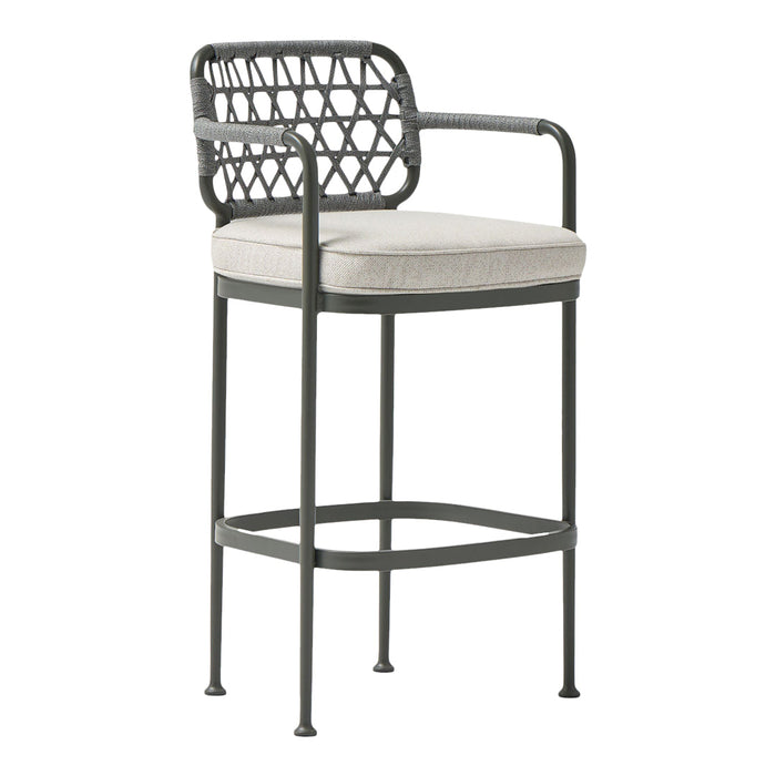 Gray and black bar stool with an intricate woven back pattern and a neutral upholstered seat. Perfect for modern decor.