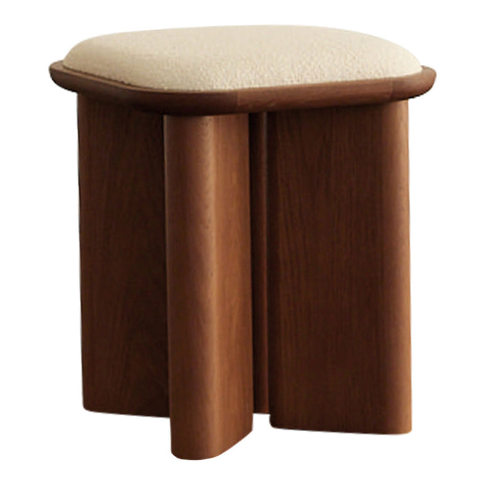 Wooden stool with a rich brown finish and a cream textured cushion on top. Simple, modern design.