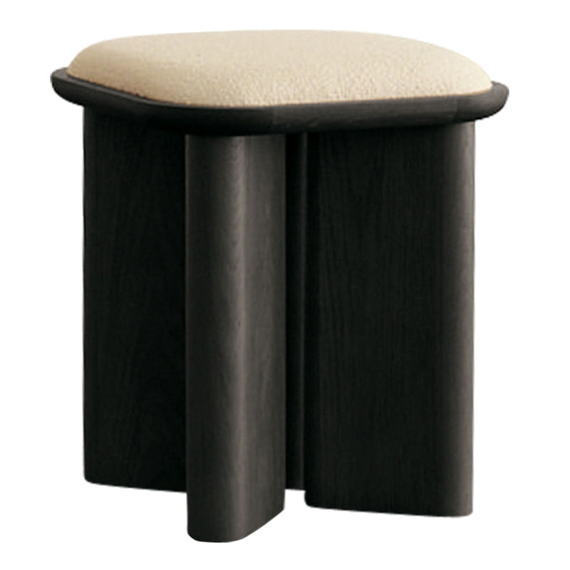 Black wooden stool with a rounded, cream-colored upholstered top and minimalist design. Perfect for modern decor.