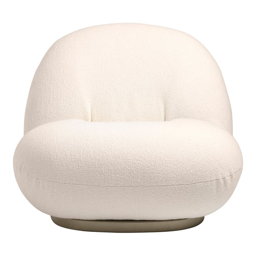 Cozy cream upholstered chair with a rounded, textured design, perfect for modern interiors.