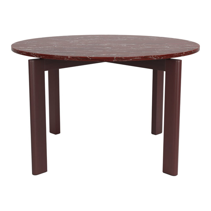 Round table with a deep burgundy marble top and textured brown legs, showcasing elegant patterns and rich colors.
