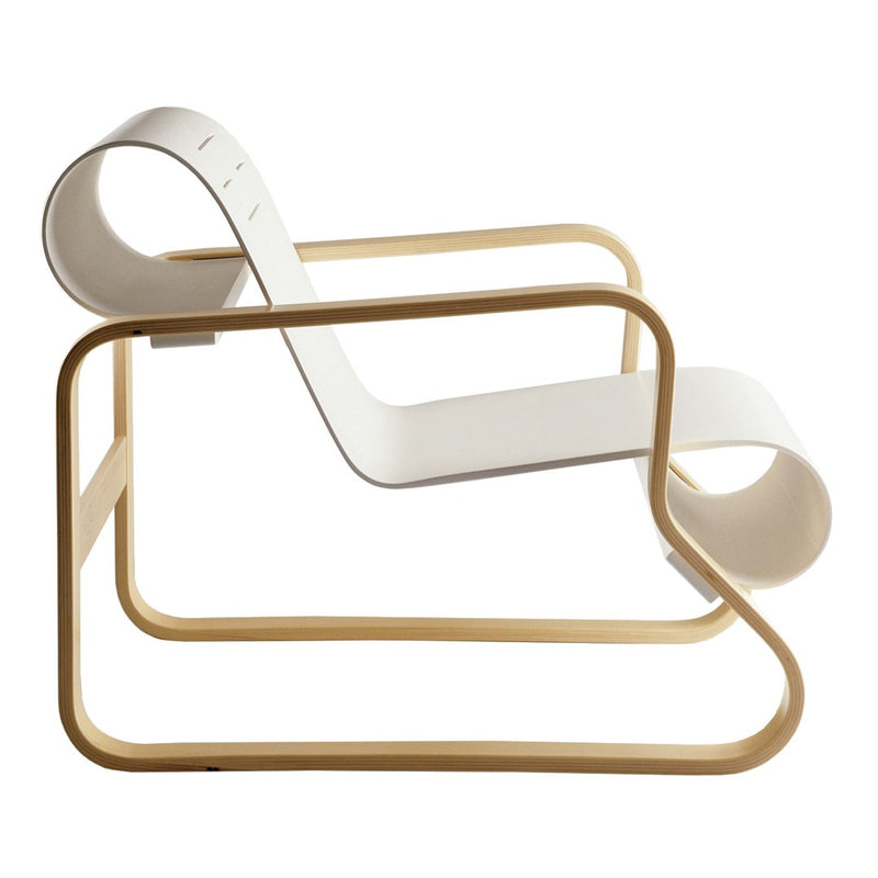 Stylish white lounge chair with smooth curves and a minimalist wooden frame. Modern design with clean lines.