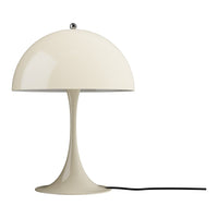 Beige table lamp with a white shade on a white background