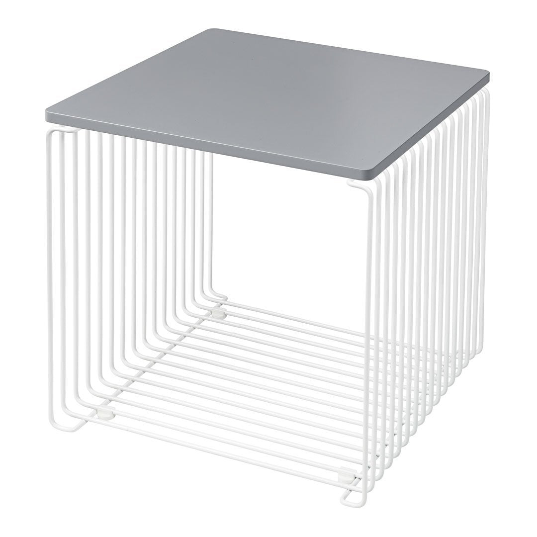 Gray square tabletop on a white wire frame, featuring sleek modern lines and an open design.