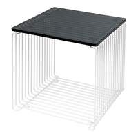 Modern cube side table with a sleek black glass top and white wireframe design, perfect for contemporary decor.