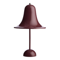 Glossy maroon bell-shaped table lamp with a smooth finish and circular base, adding a modern touch to any decor.
