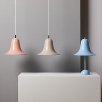 "Pastel pink, beige, and blue pendant lamps with smooth, glossy finishes against a minimalist backdrop."