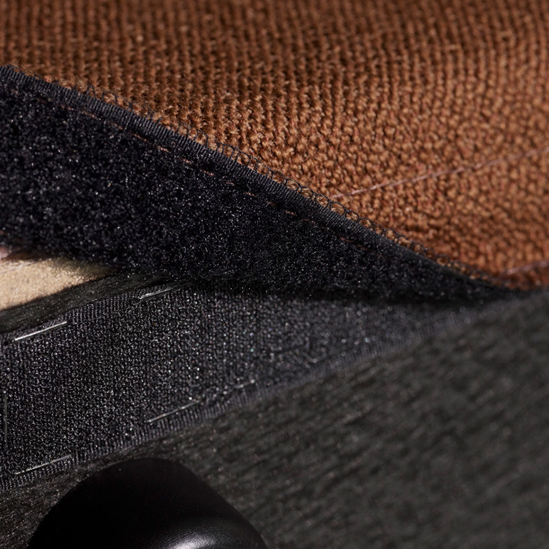 Brown and black textured fabric layers showcasing rich patterns and contrasting colors for a stylish design.