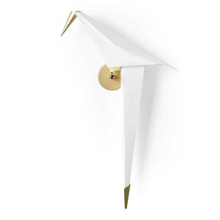 White wall lamp with sleek origami design and gold accents, creating a modern and elegant aesthetic.