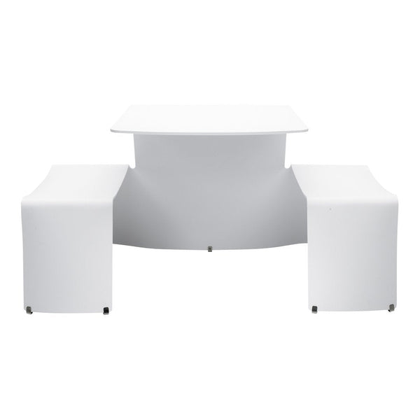 Modern white table with smooth surfaces and minimalist design, complemented by matching white benches.