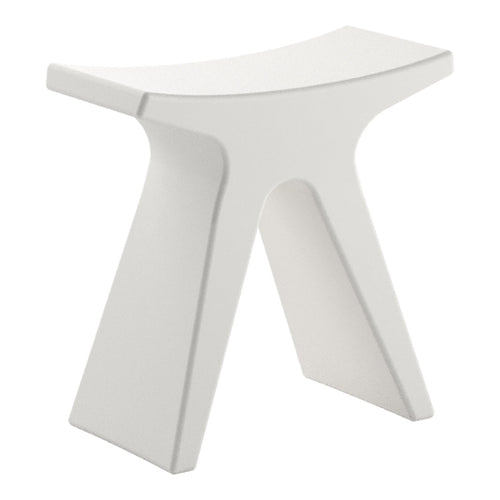 Modern white stool with a minimalist design and smooth surface, featuring a unique shape and no patterns.