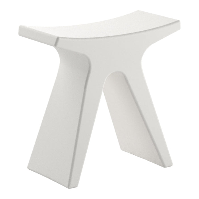 Modern white stool with a minimalist design and smooth surface, featuring a unique shape and no patterns.