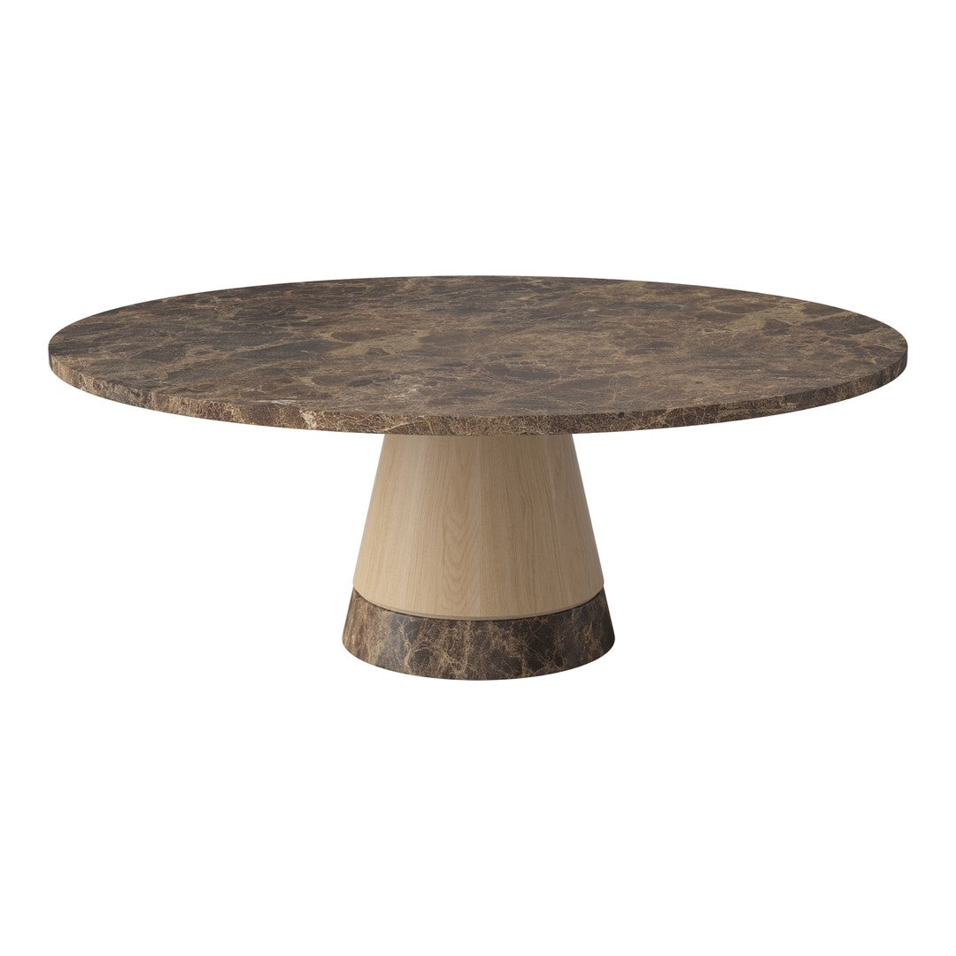 Round marble coffee table features a dark, patterned top with a light, smooth base for a modern contrast.