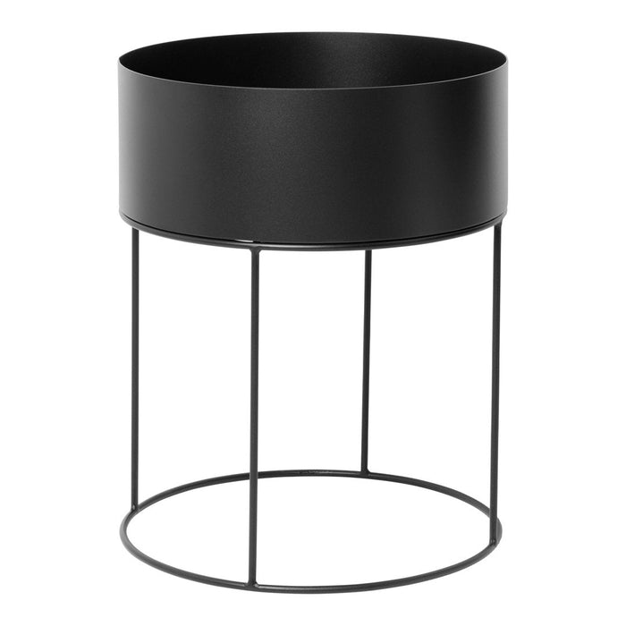 Black metal planter with a sleek, minimalist design and a circular base, perfect for modern decor.