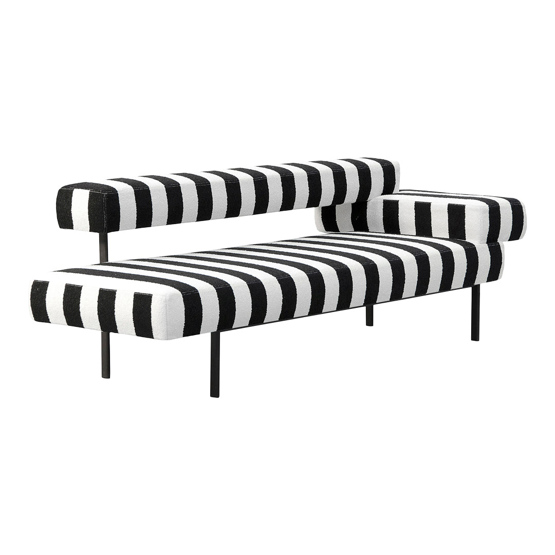 Black and white striped sofa with modern design and plush upholstery, adding a bold touch to any living space.