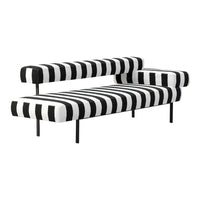 Black and white striped sofa with modern design and plush upholstery, adding a bold touch to any living space.