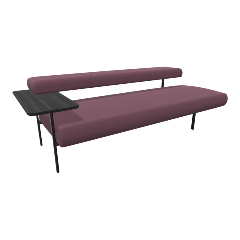 Modern burgundy sofa with sleek black side table, showcasing a minimalist design and clean lines.