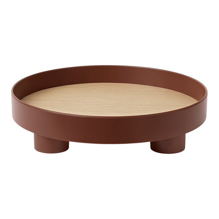 Rustic brown circular tray with a smooth wooden center and rounded legs for modern decor.