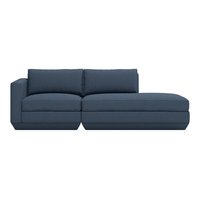 Dark navy blue sectional sofa with a sleek, minimalist design and cushioned seating. Ideal for modern living spaces.
