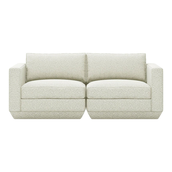 Light beige couch with subtle textured pattern, perfect for modern and minimalist interiors.