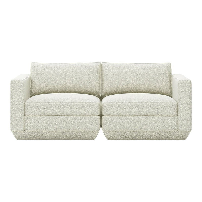 Light beige couch with subtle textured pattern, perfect for modern and minimalist interiors.
