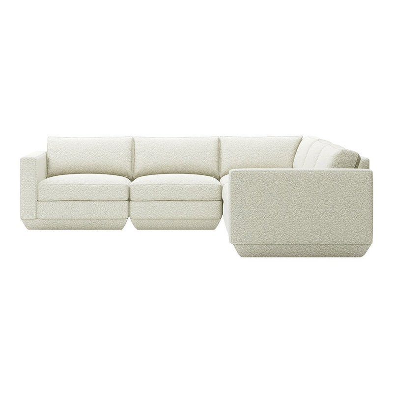Modern light beige sectional sofa with a textured fabric, showcasing clean lines and minimalistic design.