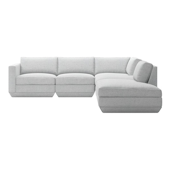 Modern sectional sofa in light gray fabric with smooth, minimalist design and no visible patterns.