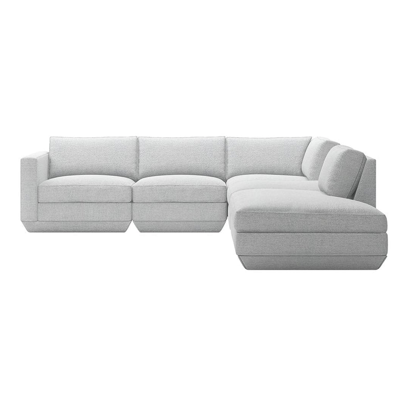 Modern sectional sofa in light gray fabric with smooth, minimalist design and no visible patterns.