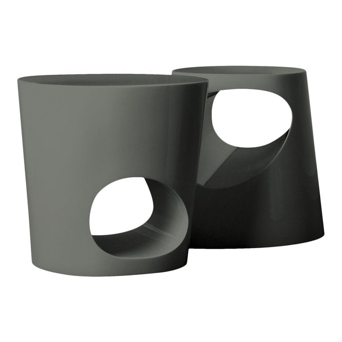 Set of two modern gray stools with unique cut-out patterns, featuring a sleek, minimalist design.